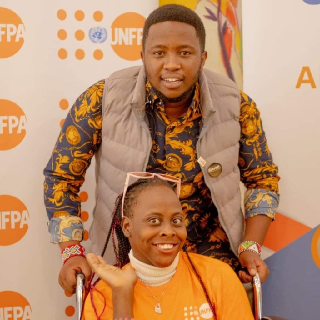Leshan Kereto with a participant at the SRHR4PWDs event marking the International Day of Persons with Disabilities, Nairobi, December 2022